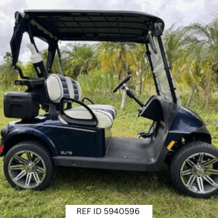 2026 E-Z-GO RXV Freedom Elite golf cart in patriot blue with 14-inch wheels, premium seats, club protector, windshield, and lithium battery
