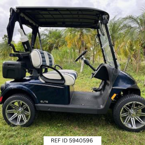 2026 E-Z-GO RXV Freedom Elite golf cart in patriot blue with 14-inch wheels, premium seats, club protector, windshield, and lithium battery