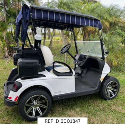 2027 E-Z-GO RXV Freedom Elite golf cart in bright white with 14-inch wheels, premium seats, windshield, and Samsung Lithium battery