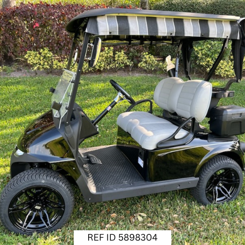 2025 E-Z-GO RXV Freedom Elite Black golf cart with Sunbrella enclosure and premium seats