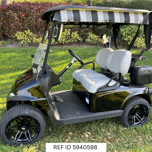2026 E-Z-GO RXV Freedom Elite Black golf cart with Sunbrella enclosure and premium seats
