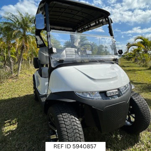 2026 E-Z-GO RXV Freedom Elite golf cart with carbon fiber steering wheel and Sunbrella enclosure
