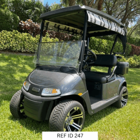 2020 charcoal E-Z-GO RXV Elite golf cart with 14-inch wheels, premium seats, and Sunbrella enclosure