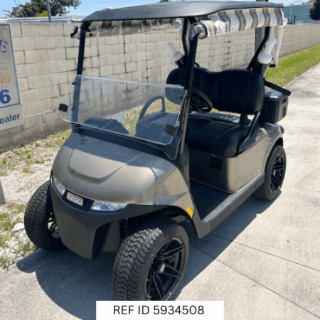 2026 E-Z-GO RXV Elite Almond with Sunbrella enclosure and premium features