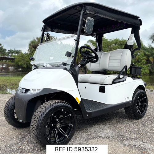 2026 E-Z-GO RXV Elite Bright White with enclosure, windshield, custom wheels, and premium seats