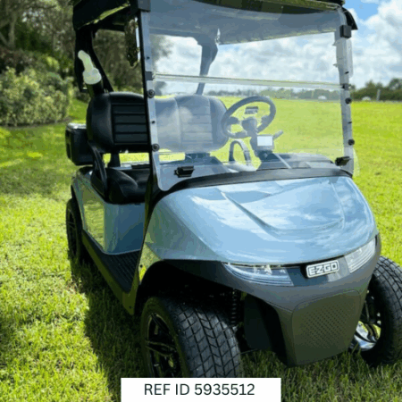 2026 E-Z-GO RXV Elite Ocean Grey with windshield, premium seats, custom wheels, and enclosure