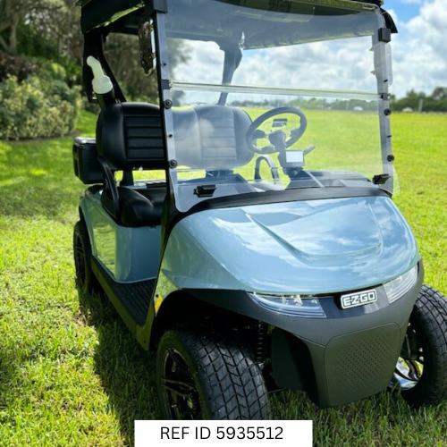 2026 E-Z-GO RXV Elite Ocean Grey with windshield, premium seats, custom wheels, and enclosure