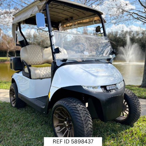 2025 E-Z-GO RXV Freedom Elite Bright White with custom enclosure, premium seats, and custom wheels