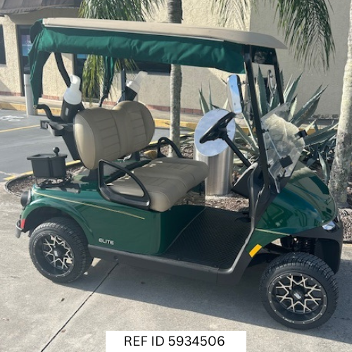 2026 E-Z-GO RXV Elite Green with enclosure, custom wheels, and premium seats