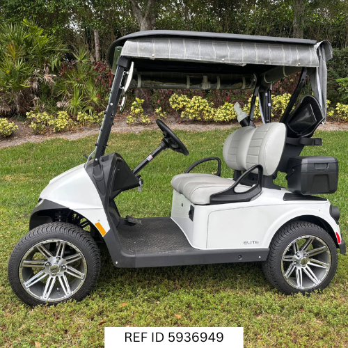 2026 E-Z-GO RXV Freedom Elite Bright White with enclosure, premium seats, and custom wheels