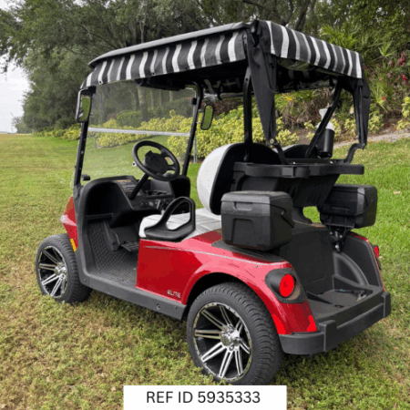 2026 E-Z-GO RXV Elite Red with custom wheels, enclosure, and premium seats