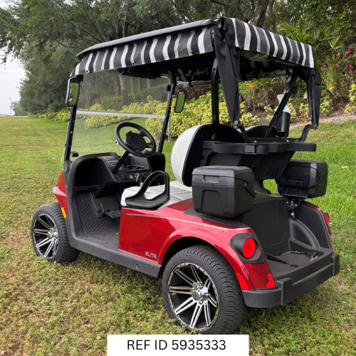 2026 E-Z-GO RXV Elite Red with custom wheels, enclosure, and premium seats