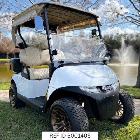 2027 E-Z-GO RXV2 Elite Bright White with custom enclosure, premium seats, and custom wheels
