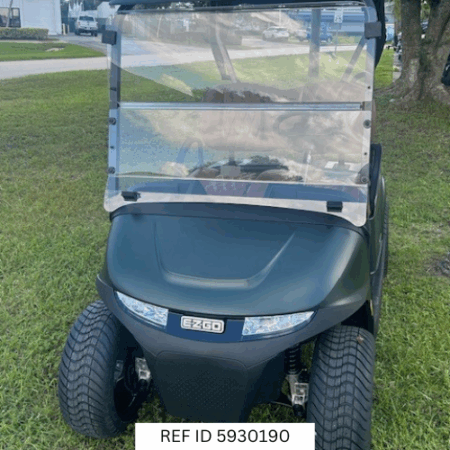 2026 E-Z-GO RXV2 ELiTE golf cart in matte green with custom wheels and premium seats at Sunshine Golf Car in South Florida.